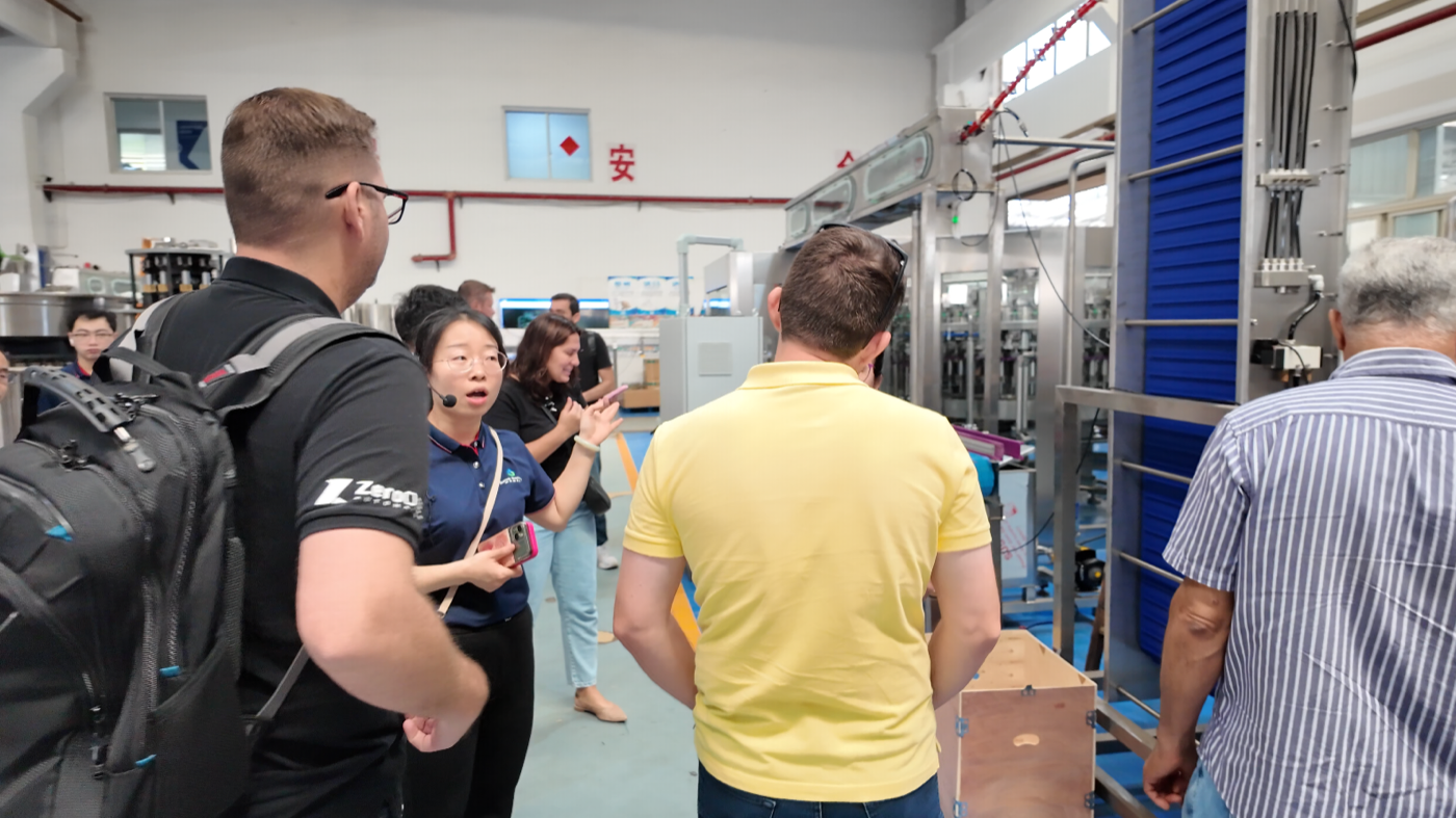 Factory Visit Sokos team introducing filling line equipment during customer factory visit